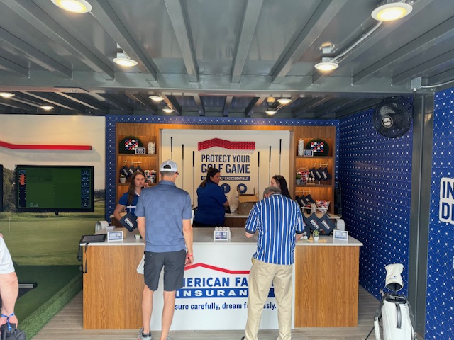 American Family Insurance golf simulator activation inside a branded container