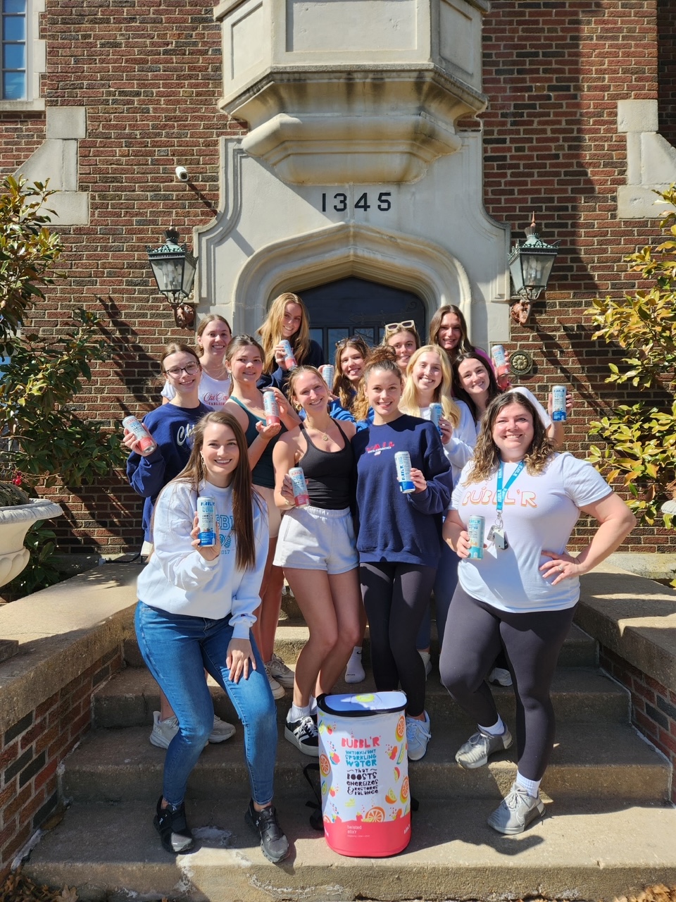 Sorority group with a BUBBL'R cooler on house steps