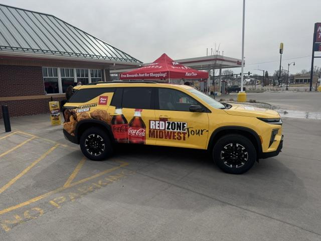 Kwik Trip Red Zone Midwest Tour vehicle parked at a store
